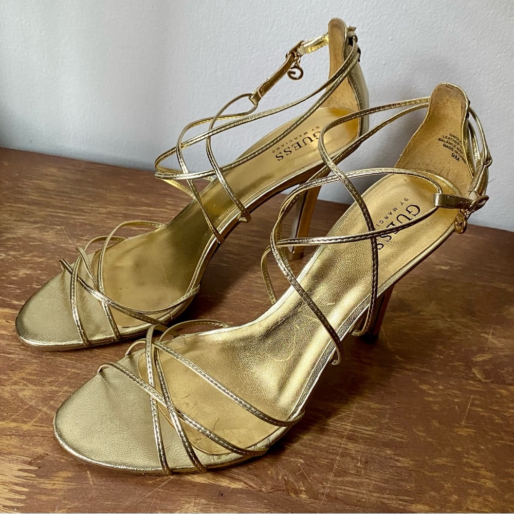 Beautiful fancy gold heels by Guess